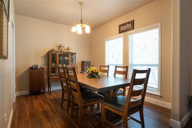 11525 Fm 86th Rd, Lockhart, TX 78644 - dining space with a chandelier, baseboards, and dark wood-type flooring