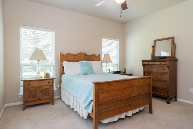 11525 Fm 86th Rd, Lockhart, TX 78644 - bedroom featuring light colored carpet, baseboards, and a ceiling fan