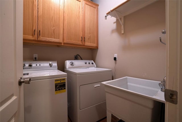 11525 Fm 86th Rd, Lockhart, TX 78644 - laundry room featuring washing machine and clothes dryer and cabinet space