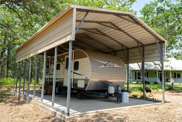 11525 Fm 86th Rd, Lockhart, TX 78644 - view of parking / parking lot with a detached carport