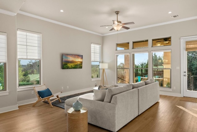 5502 Patagonia Pass, Austin, TX 78738 - living area featuring a ceiling fan, wood finished floors, ornamental molding, baseboards, and recessed lighting