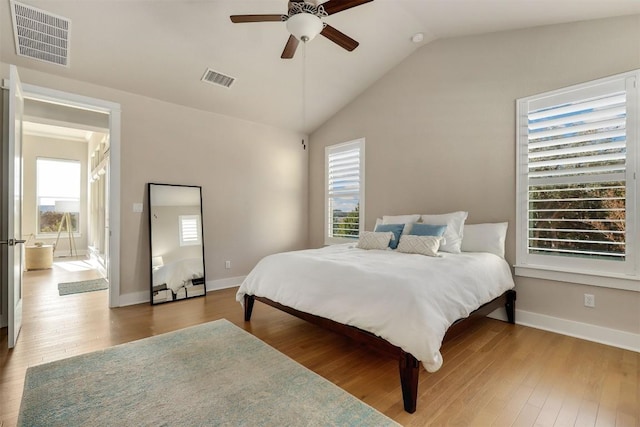 5502 Patagonia Pass, Austin, TX 78738 - bedroom with wood finished floors, lofted ceiling, baseboards, and ceiling fan