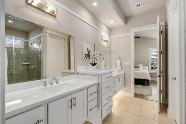 5502 Patagonia Pass, Austin, TX 78738 - bathroom with vanity, a shower stall, plenty of natural light, tile patterned flooring, and recessed lighting