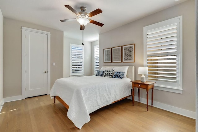 5502 Patagonia Pass, Austin, TX 78738 - bedroom with light wood-type flooring and ceiling fan