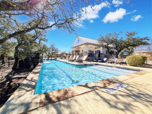 5502 Patagonia Pass, Austin, TX 78738 - community pool with a patio