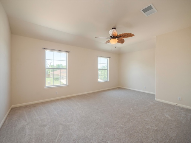 1010 Barclay Dr, Leander, TX 78641 - unfurnished room with baseboards, carpet floors, and ceiling fan