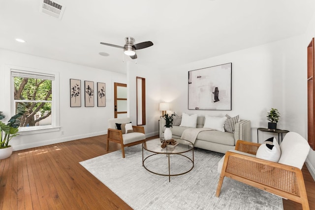 2004 Bremen St, Austin, TX 78703 - living room featuring hardwood / wood-style floors, baseboards, and a ceiling fan