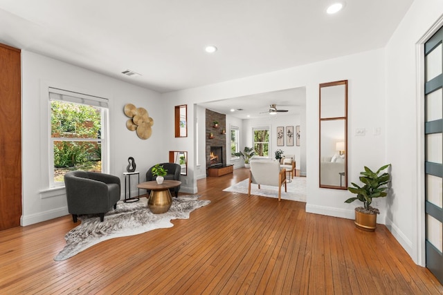 2004 Bremen St, Austin, TX 78703 - living room featuring a fireplace, recessed lighting, baseboards, hardwood / wood-style floors, and ceiling fan