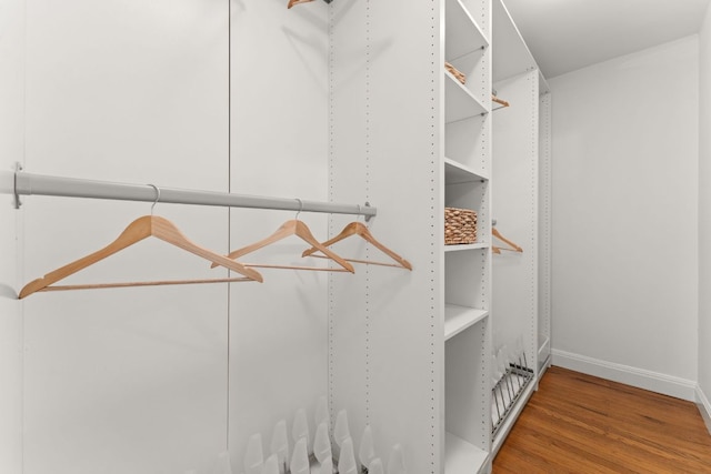 2004 Bremen St, Austin, TX 78703 - walk in closet with wood finished floors