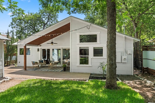 2004 Bremen St, Austin, TX 78703 - back of property with a wooden deck, ceiling fan, and an outdoor hangout area