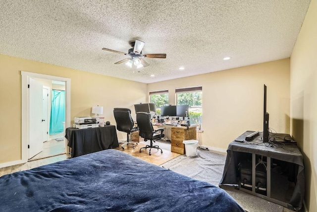 7900 Keneshaw Dr, Austin, TX 78745 - bedroom featuring a textured ceiling, an office area, recessed lighting, and baseboards