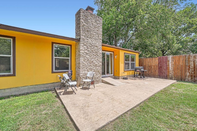 7900 Keneshaw Dr, Austin, TX 78745 - back of house with a chimney and a patio area