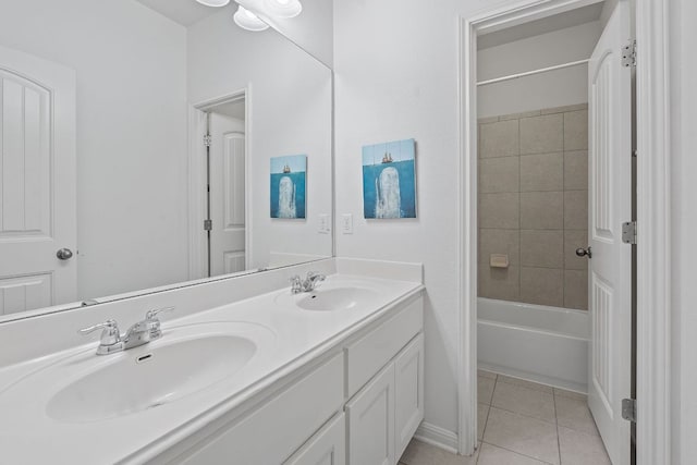 2809 Coral Valley Dr, Leander, TX 78641 - full bath with double vanity, tile patterned flooring, and shower / bath combination