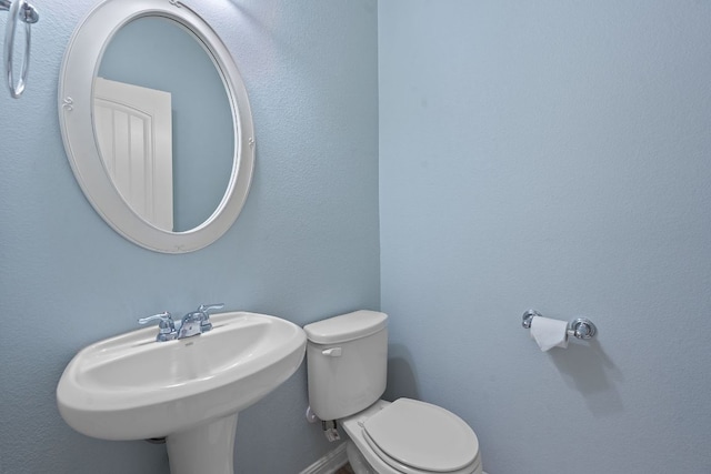 2809 Coral Valley Dr, Leander, TX 78641 - half bath with toilet and a sink