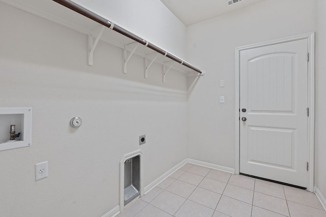 2809 Coral Valley Dr, Leander, TX 78641 - laundry room with electric dryer hookup, gas dryer hookup, washer hookup, and light tile patterned flooring