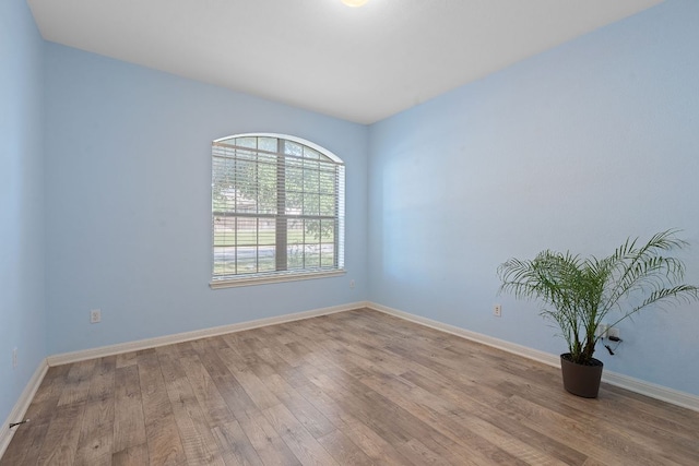 2809 Coral Valley Dr, Leander, TX 78641 - unfurnished room with wood finished floors and baseboards