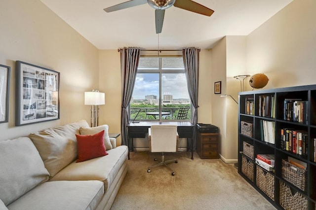 54 Rainey St Unit 814, Austin, TX 78701 - office area featuring carpet floors, a ceiling fan, and baseboards