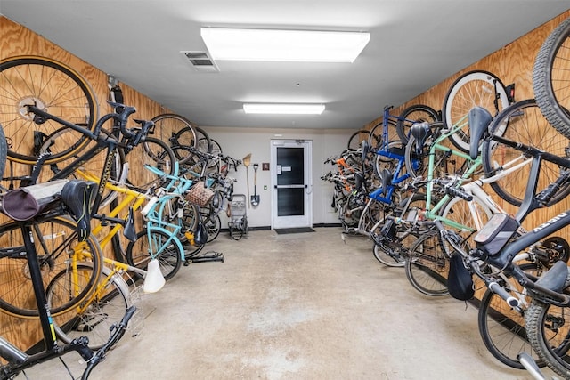 54 Rainey St Unit 814, Austin, TX 78701 - garage with wooden walls and bike storage