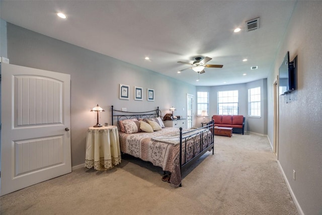 211 Spring Garden Dr, Hutto, TX 78634 - bedroom featuring light colored carpet, recessed lighting, baseboards, and a ceiling fan