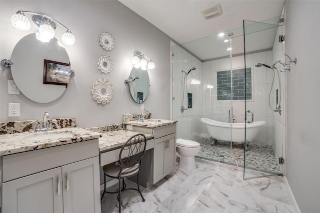211 Spring Garden Dr, Hutto, TX 78634 - full bathroom featuring a shower stall, two vanities, marble look tile flooring, toilet, and recessed lighting