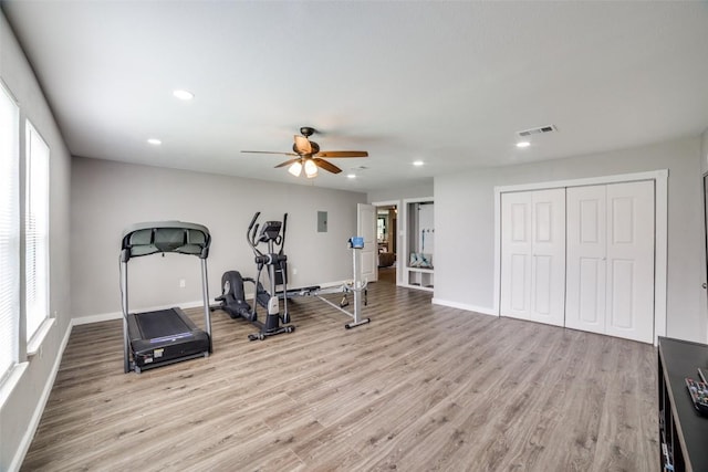 211 Spring Garden Dr, Hutto, TX 78634 - workout area featuring wood finished floors, recessed lighting, baseboards, ceiling fan, and plenty of natural light
