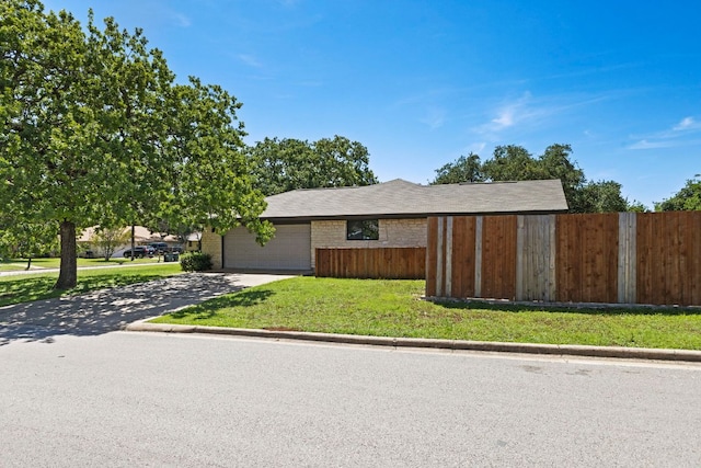 3312 Broken Spoke Trl, Georgetown, TX 78628 - view of front facade with concrete driveway and a garage