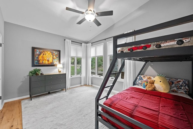 3101 Fleece Flower Cv, Austin, TX 78735 - bedroom with lofted ceiling, baseboards, wood finished floors, and ceiling fan
