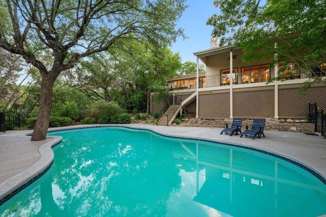 3101 Fleece Flower Cv, Austin, TX 78735 - view of pool featuring stairway, ceiling fan, a patio, and a deck