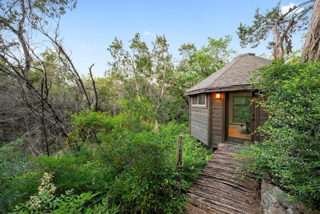 3101 Fleece Flower Cv, Austin, TX 78735 - view of yard with an outbuilding
