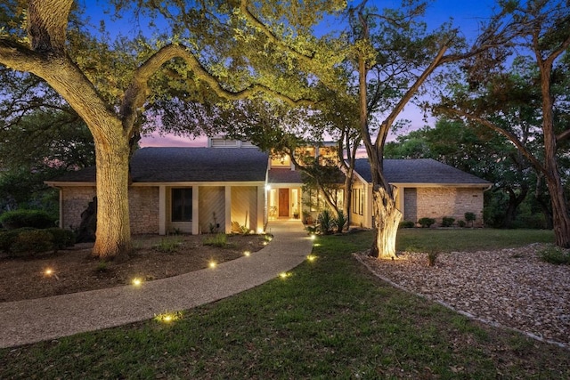 3101 Fleece Flower Cv, Austin, TX 78735 - view of front of house featuring a front lawn and a shingled roof