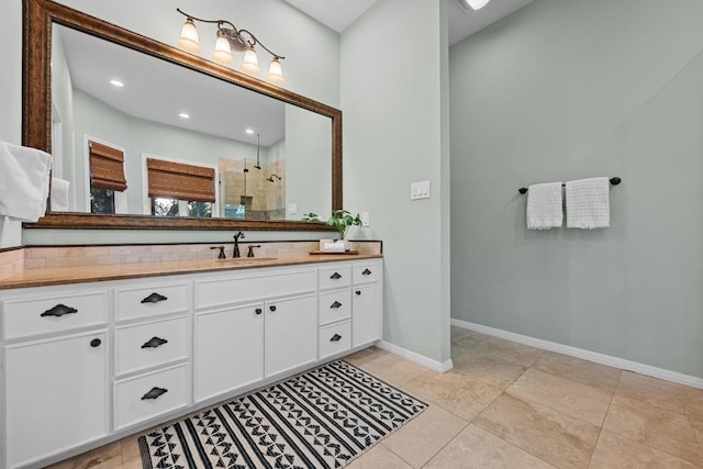 3101 Fleece Flower Cv, Austin, TX 78735 - full bath featuring vanity, a tile shower, baseboards, and tile patterned floors