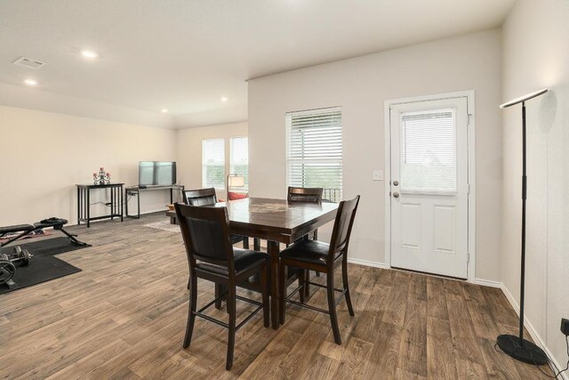 15000 Upland Willow Rd, Austin, TX 78724 - dining space featuring wood finished floors, recessed lighting, and baseboards