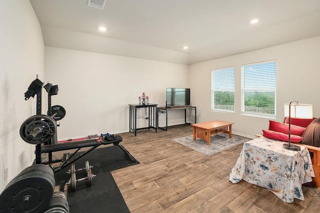 15000 Upland Willow Rd, Austin, TX 78724 - workout room featuring wood finished floors, recessed lighting, and baseboards