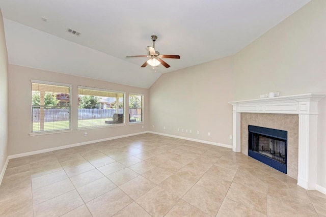 1803 Valle Verde Dr, Cedar Park, TX 78641 - unfurnished living room featuring light tile patterned floors, vaulted ceiling, ceiling fan, a fireplace, and baseboards