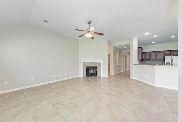 1803 Valle Verde Dr, Cedar Park, TX 78641 - unfurnished living room featuring ceiling fan, recessed lighting, a sink, a tile fireplace, and baseboards