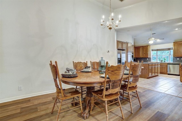 900 Cedar Park Dr, Cedar Park, TX 78613 - dining room featuring a chandelier, light wood finished floors, ornamental molding, baseboards, and a ceiling fan