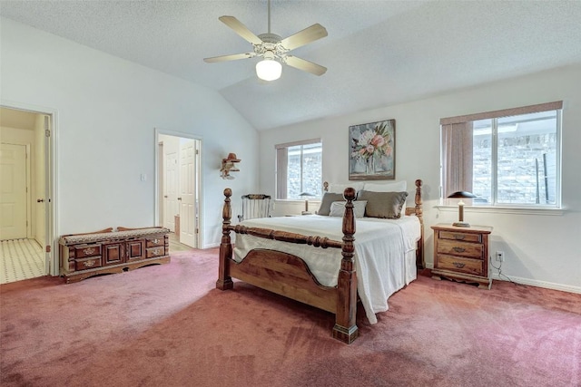 900 Cedar Park Dr, Cedar Park, TX 78613 - carpeted bedroom with lofted ceiling, baseboards, and ceiling fan