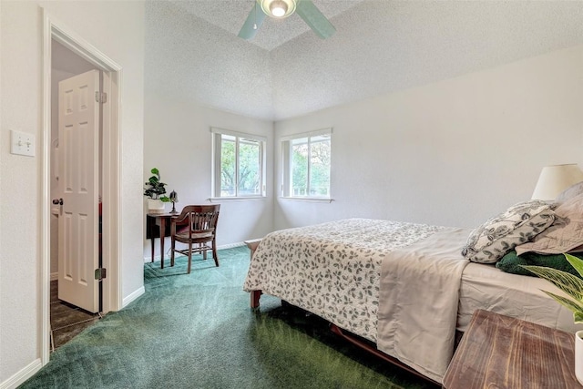 900 Cedar Park Dr, Cedar Park, TX 78613 - carpeted bedroom featuring a textured ceiling, baseboards, and a ceiling fan