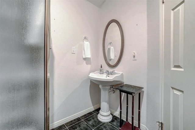 900 Cedar Park Dr, Cedar Park, TX 78613 - bathroom with tile patterned floors, a shower stall, and baseboards