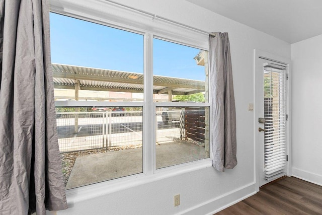 1101 Grove Blvd Unit 803, Austin, TX 78741 - unfurnished room with wood finished floors and baseboards