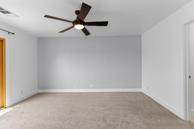 1101 Grove Blvd Unit 803, Austin, TX 78741 - empty room featuring carpet flooring, ceiling fan, and baseboards