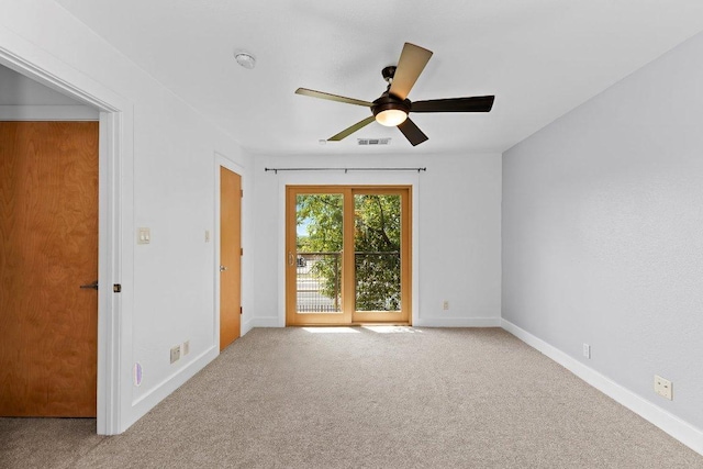 1101 Grove Blvd Unit 803, Austin, TX 78741 - spare room with ceiling fan, carpet floors, baseboards, and a smoke detector