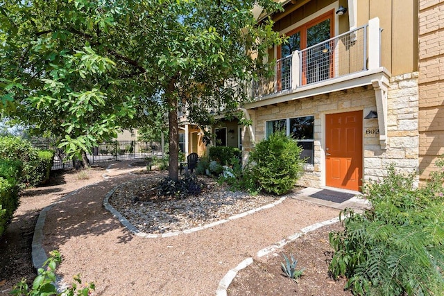 1101 Grove Blvd Unit 803, Austin, TX 78741 - view of yard featuring a balcony
