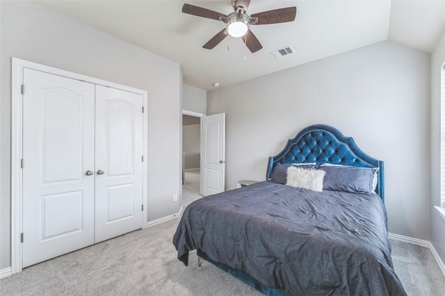302 Emory Fields Dr, Hutto, TX 78634 - carpeted bedroom featuring baseboards, ceiling fan, a closet, and vaulted ceiling