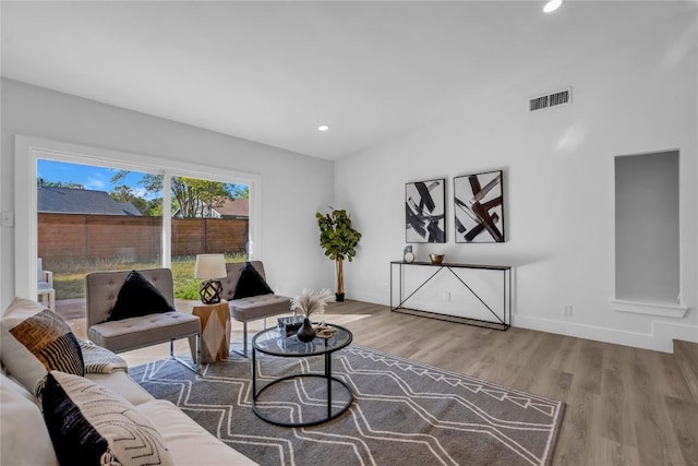 11602 Big Trl, Austin, TX 78759 - living room with wood finished floors, recessed lighting, and baseboards