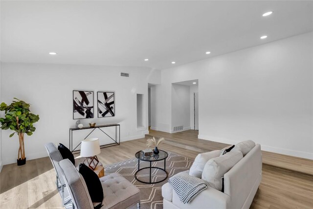 11602 Big Trl, Austin, TX 78759 - living area featuring recessed lighting and light wood-style floors