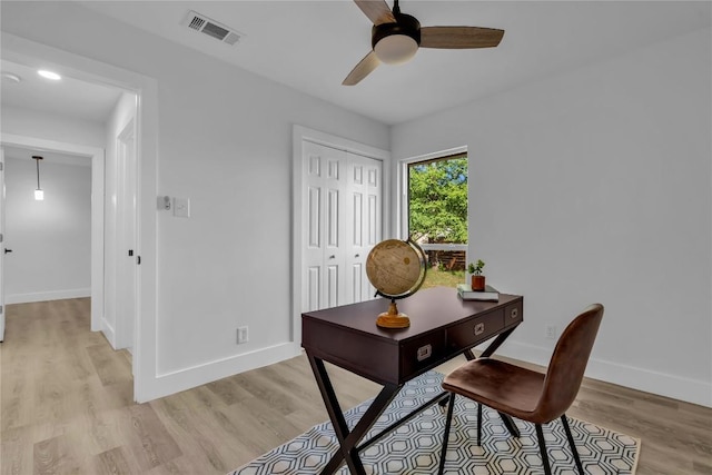11602 Big Trl, Austin, TX 78759 - office area with baseboards, light wood finished floors, and a ceiling fan