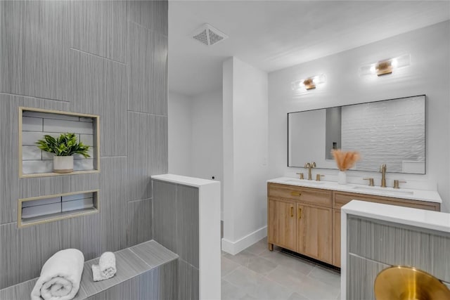 11602 Big Trl, Austin, TX 78759 - full bath with double vanity and baseboards