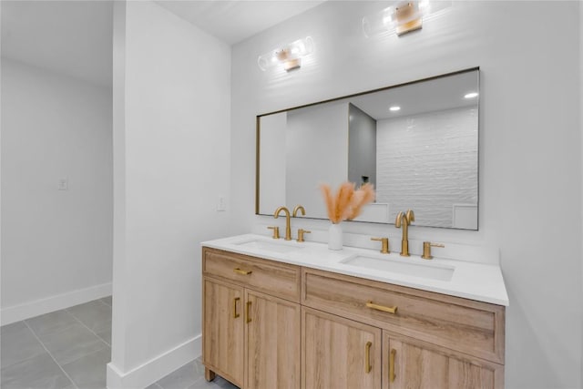 11602 Big Trl, Austin, TX 78759 - full bath with double vanity, baseboards, and tile patterned flooring