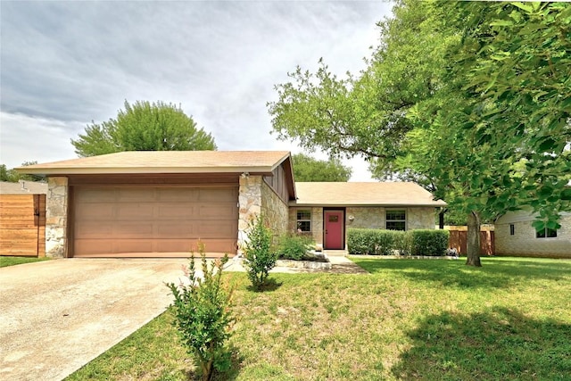 2406 Shiloh Dr, Austin, TX 78745 - ranch-style house with stone siding, a garage, and concrete driveway